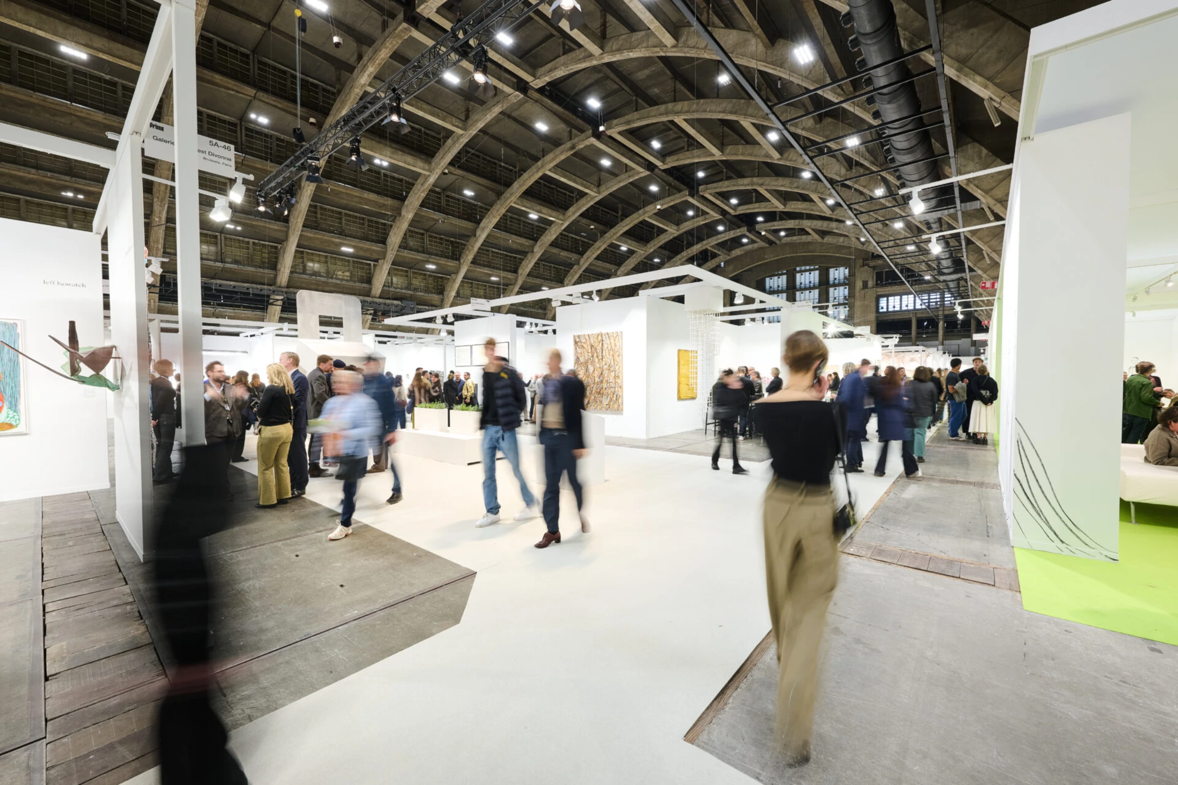 Crowd view inside Art Brussels 2026 with gallery booths and visitors.