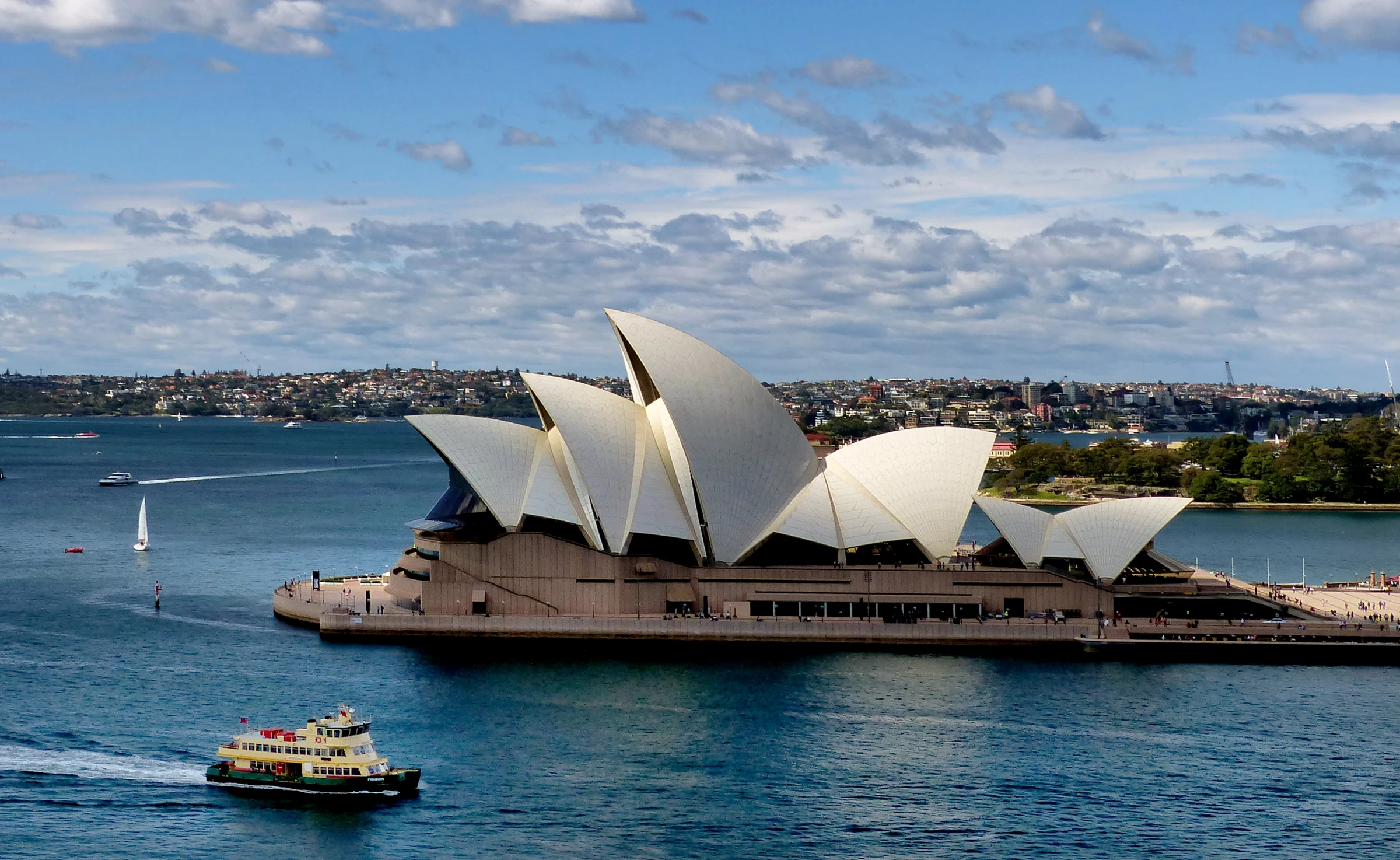 Sydney Opera House and harbor at dusk