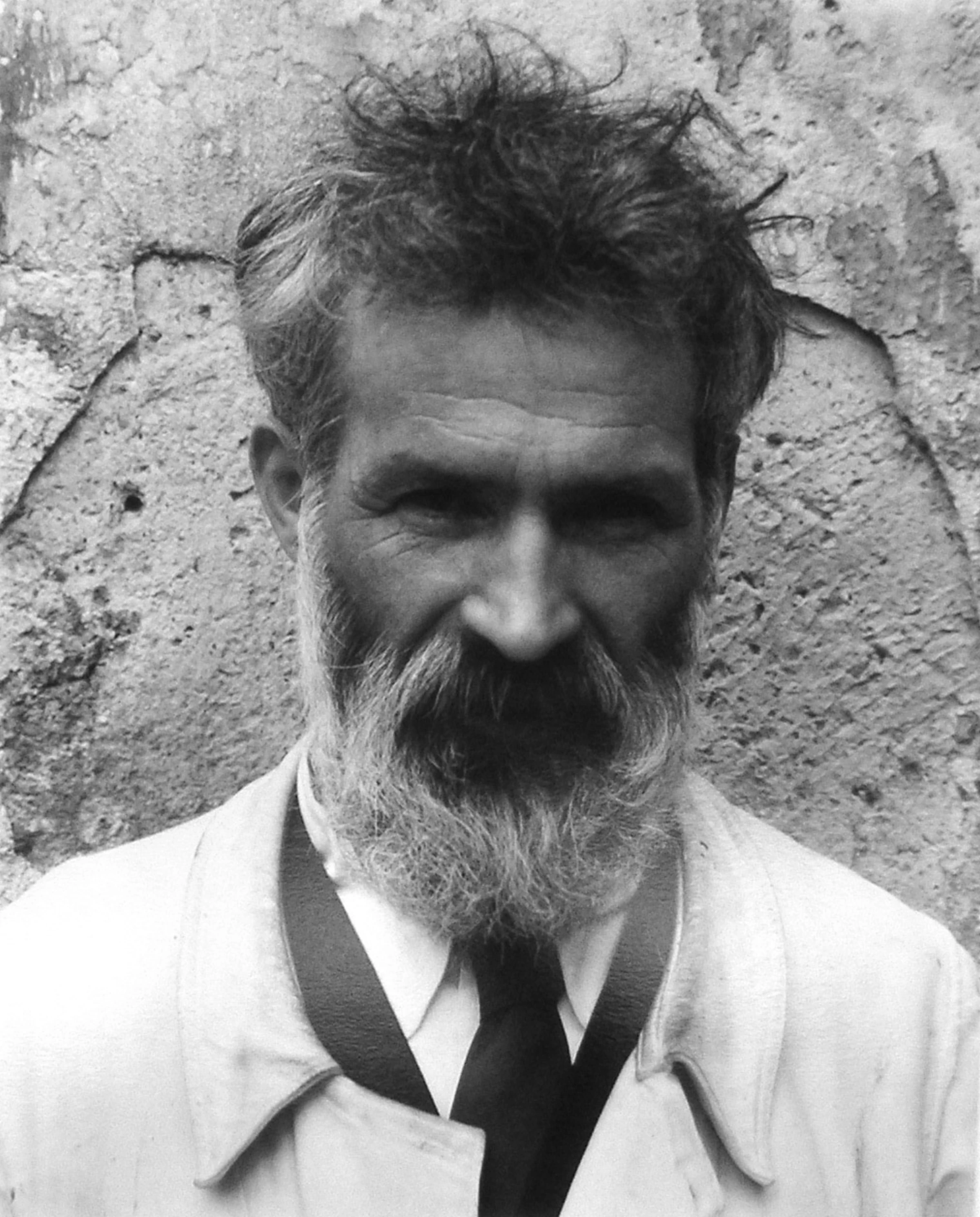Photograph of Constantin Brancusi by Edward Steichen, showing the sculptor in profile