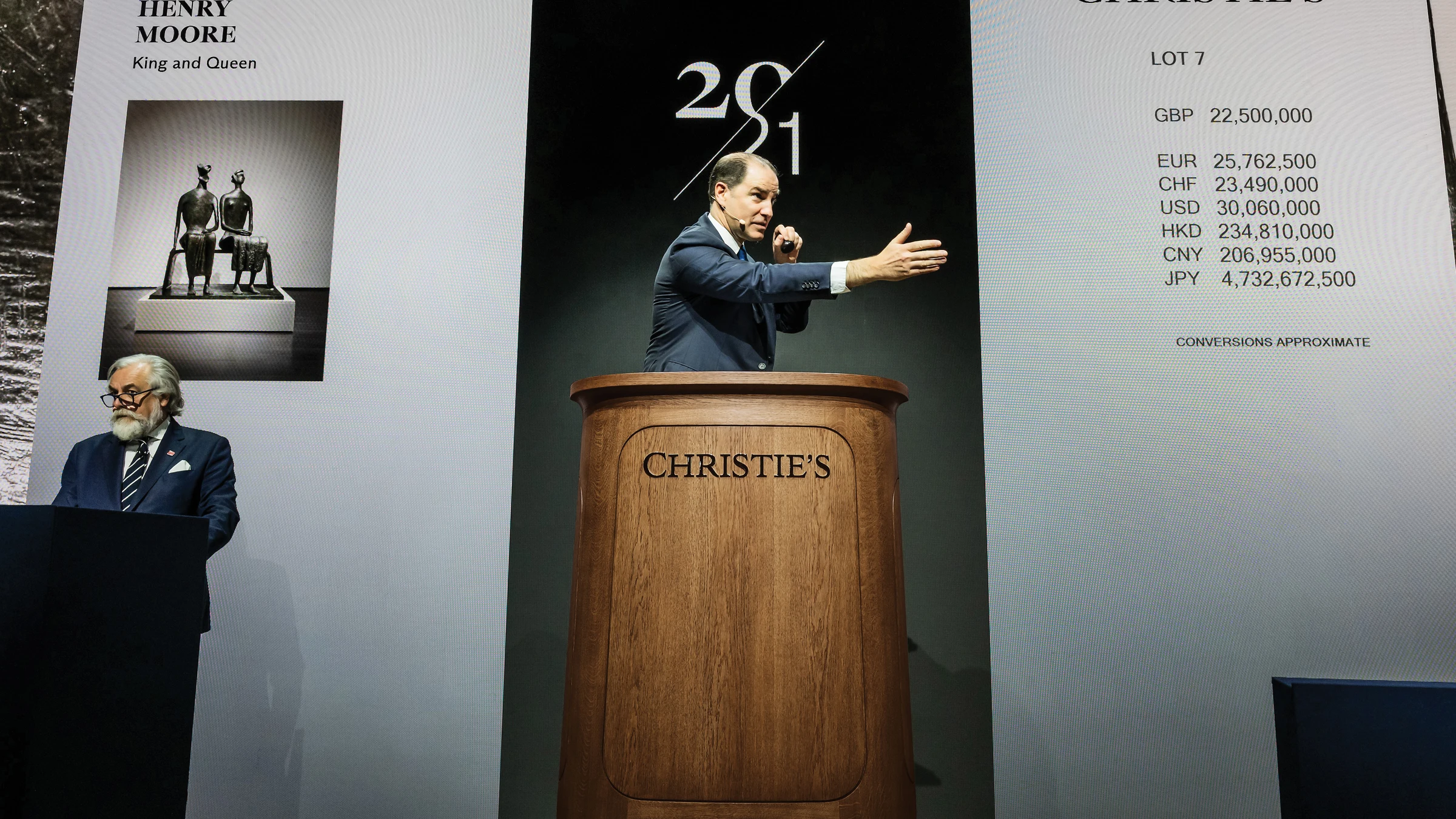 Christie's evening sale room with bidders during a London marquee auction
