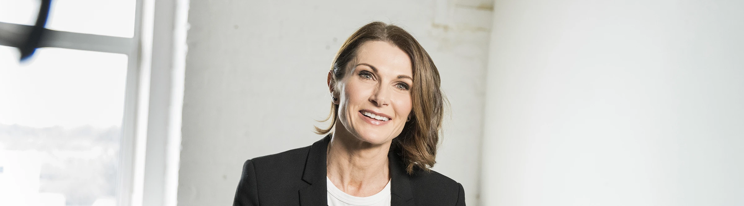 Portrait of economist Clare McAndrew used in an Art Basel market report feature.