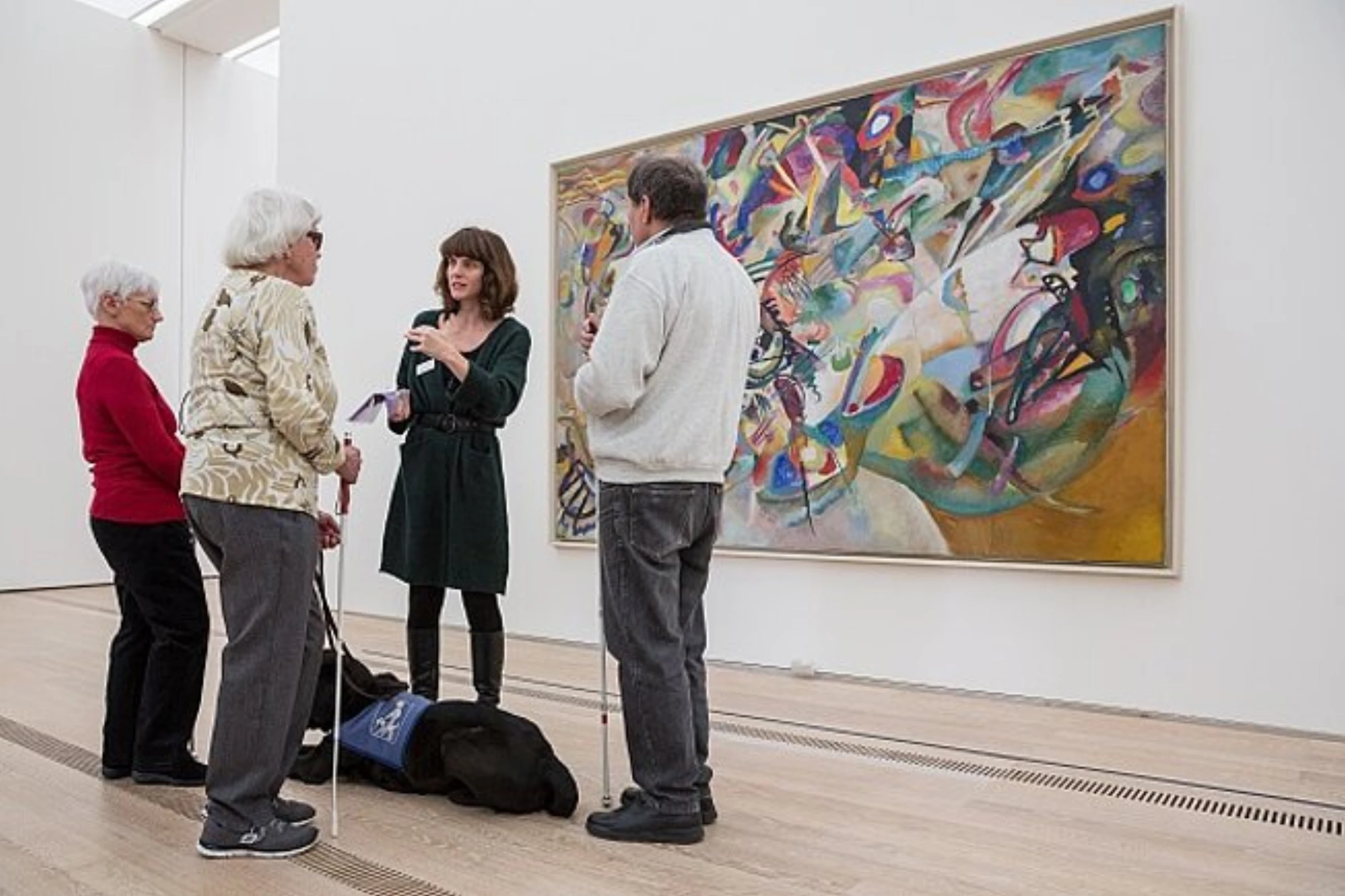 Visitors moving through an accessibility-focused guided program at Fondation Beyeler.