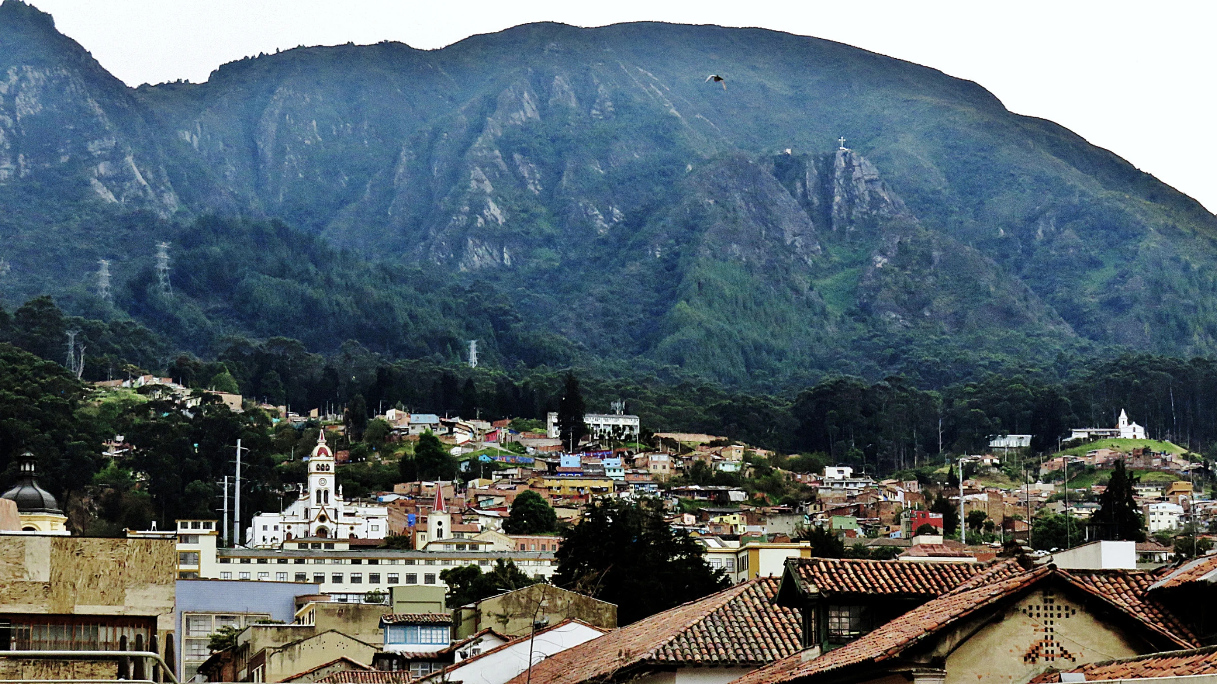Large unfinished concrete museum-like structure in an urban area