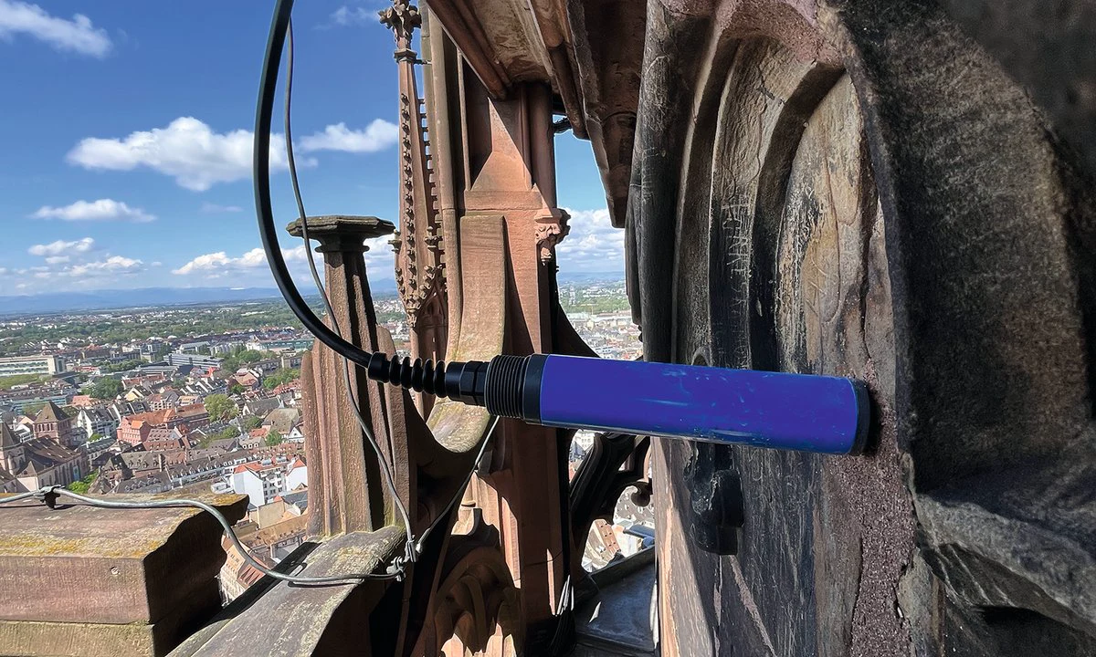 A sensor installed on stonework at Strasbourg Cathedral as part of a climate monitoring project