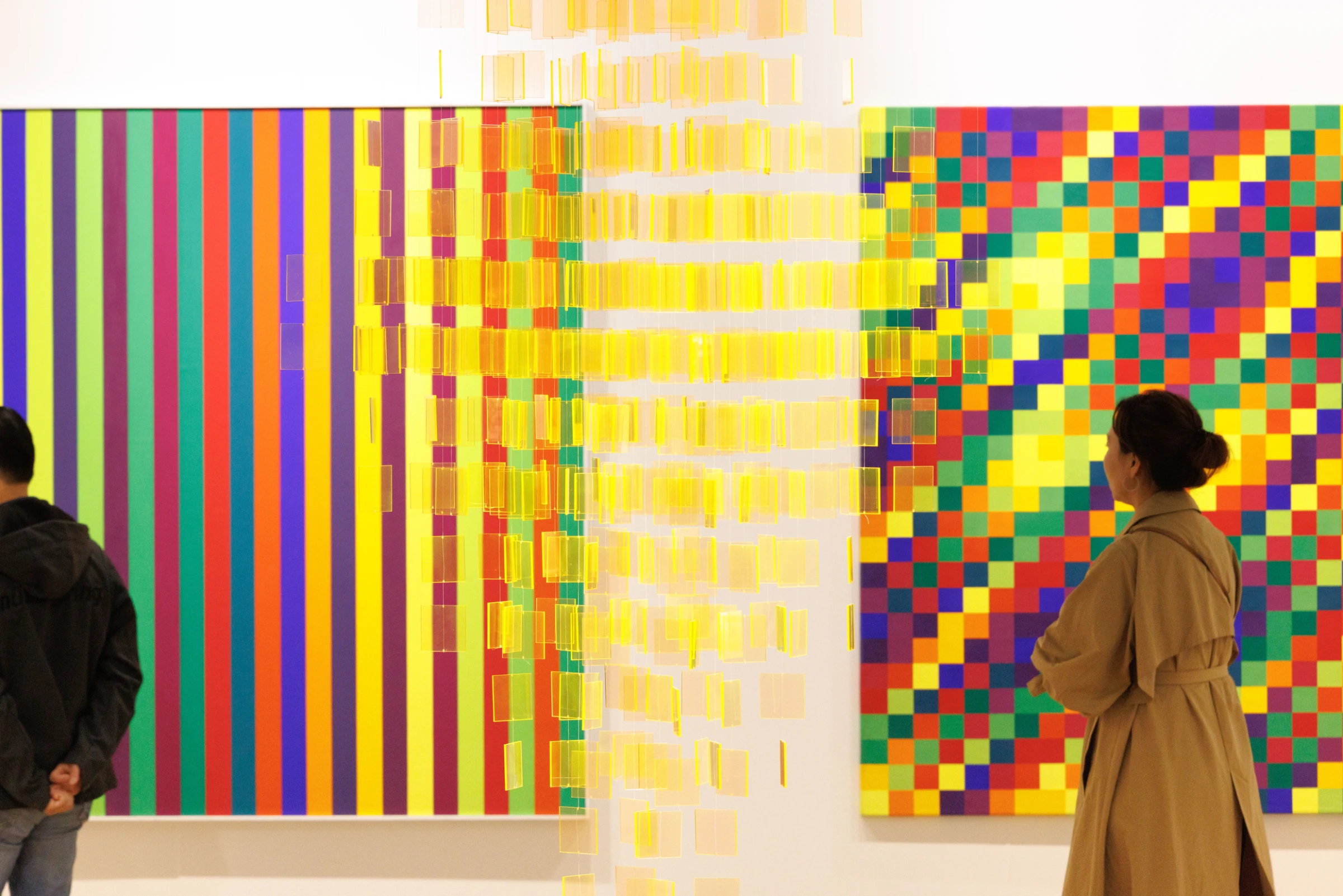 Crowd scene from an Art Basel event space.