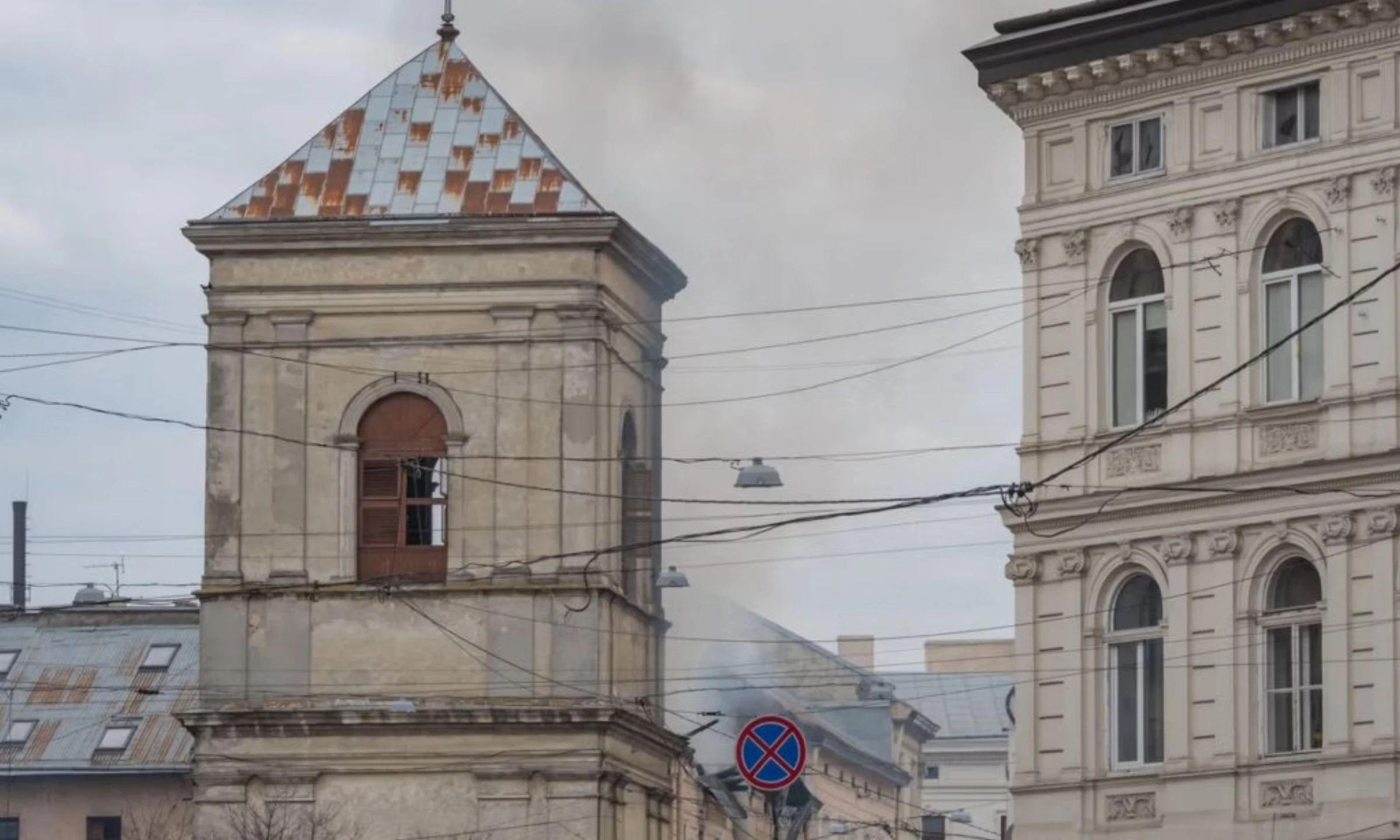 An outdoor contemporary sculpture installation in a museum setting.