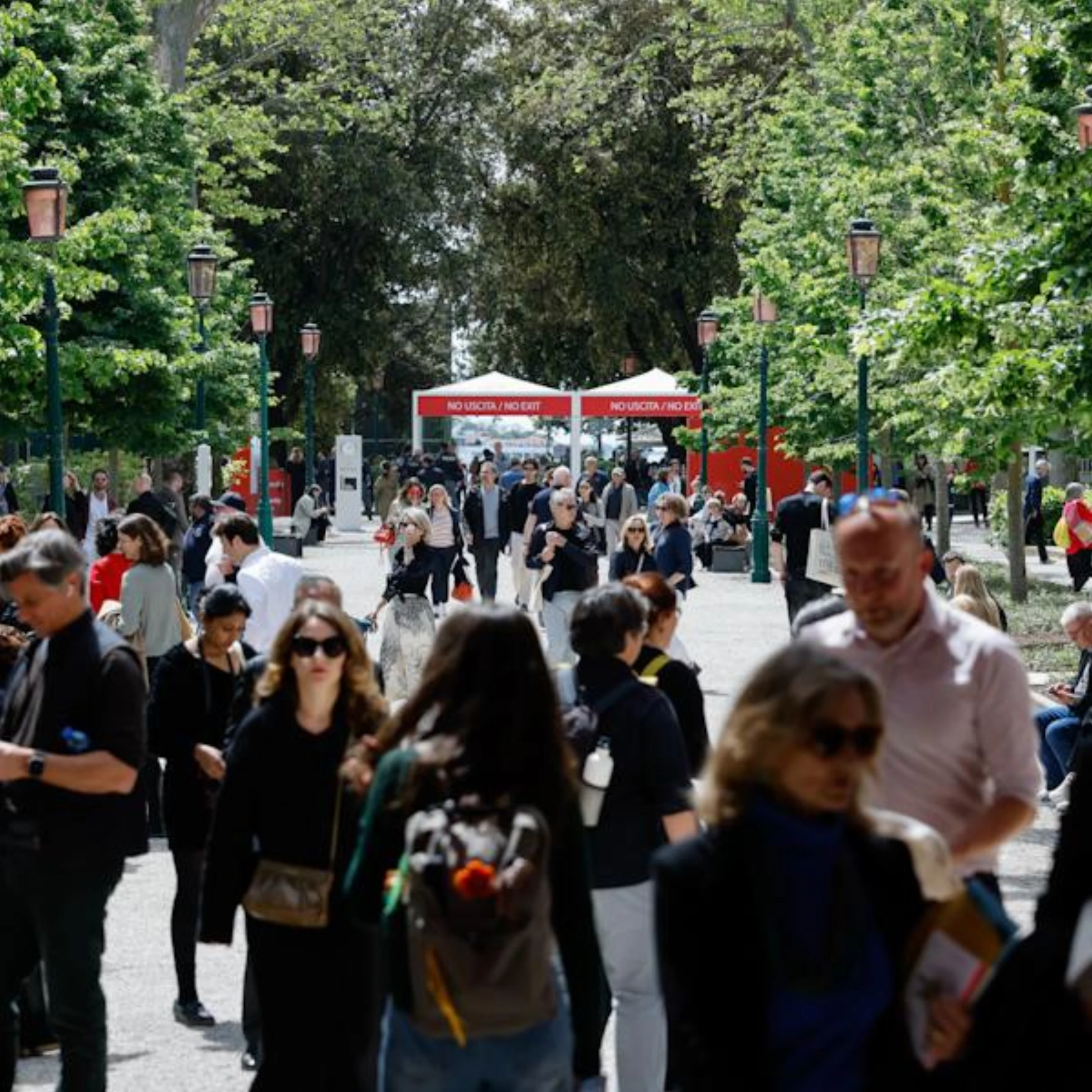 Visitors moving through a Venice Biennale exhibition space during the 2026 season