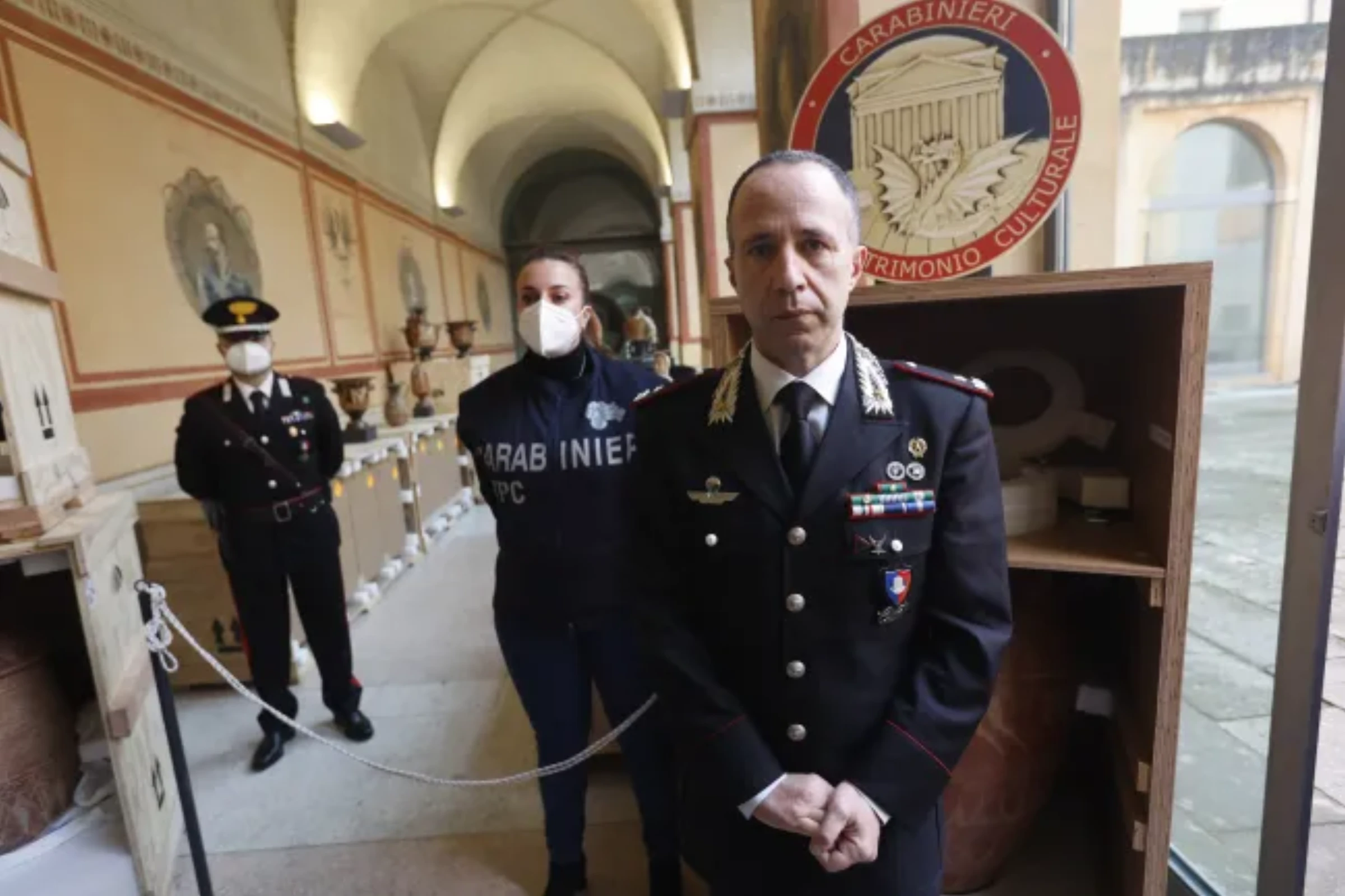 Former head of the Carabinieri Command for the Protection of Cultural Heritage Roberto Riccardi poses with seized goods, representing Italian art crime investigations