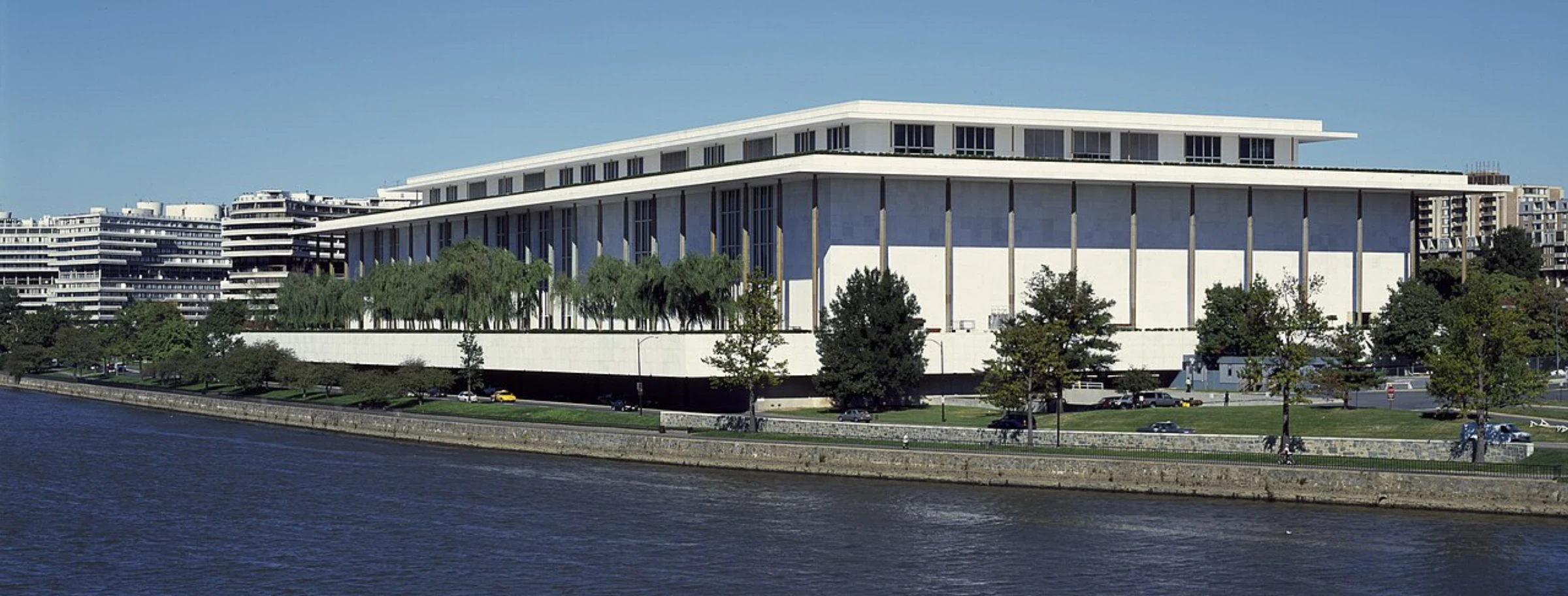 The John F. Kennedy Center for the Performing Arts in Washington D.C., showing the building's distinctive modernist facade along the Potomac River