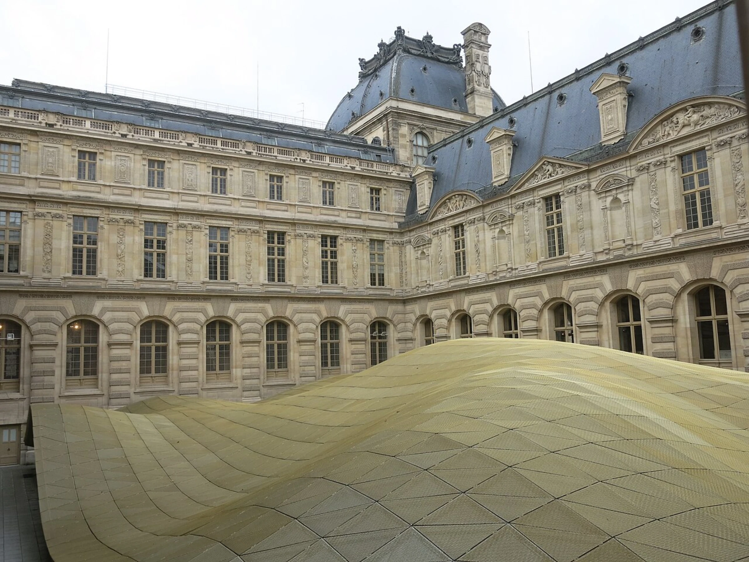 The Cour Visconti at the Louvre, home to the Department of Islamic Art, with its distinctive golden glass roof designed by architects Mario Bellini and Rudy Ricciotti