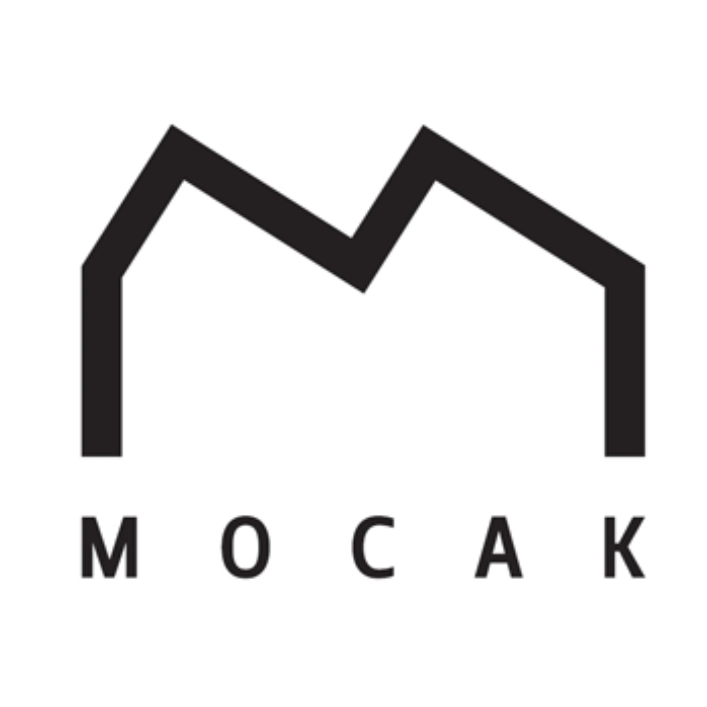 MOCAK museum branding on the exterior of the Museum of Contemporary Art in Krakow
