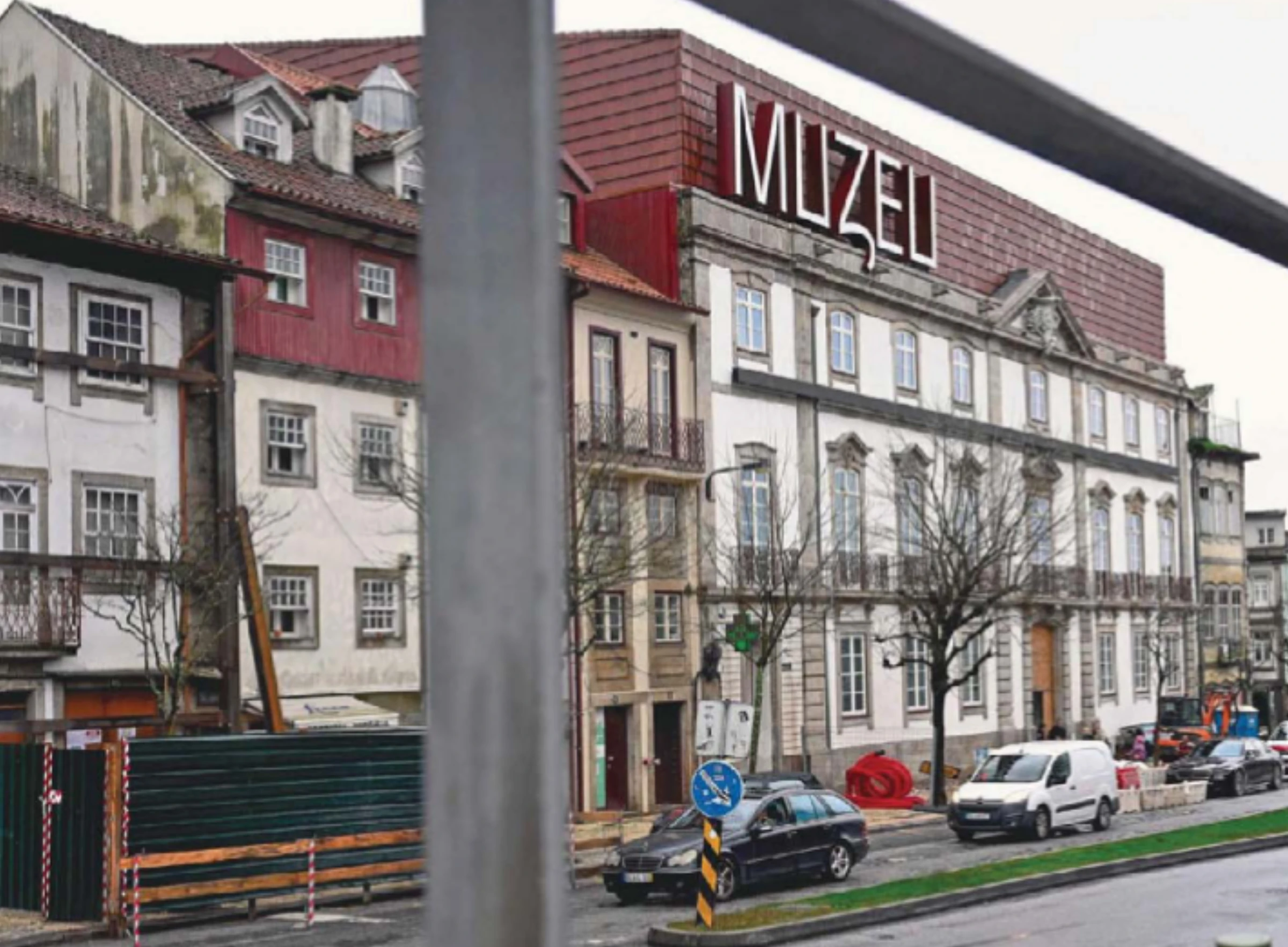 Interior view of the Muzeu DST building in Braga, showing industrial-style galleries and circulation stairs.