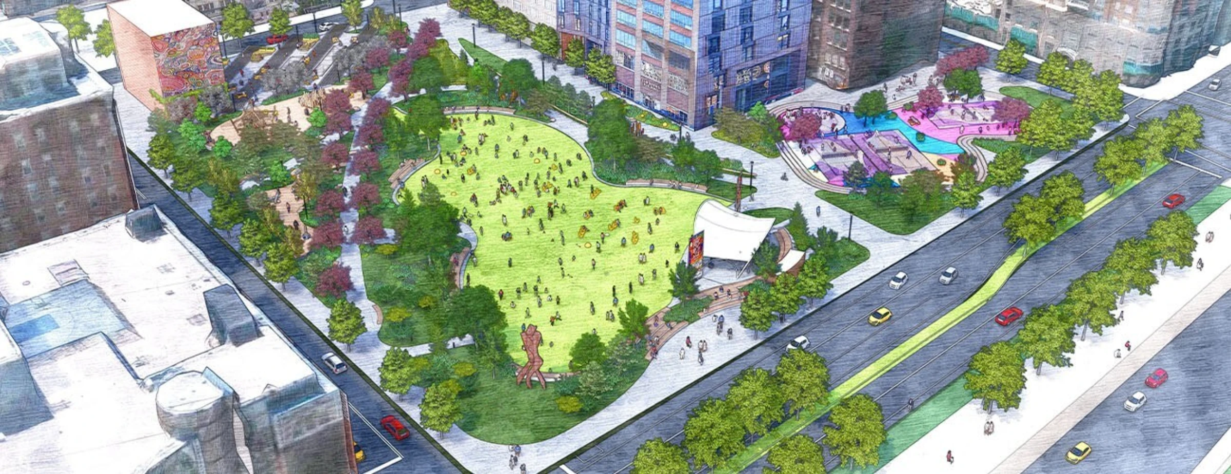 View of Arts Landing in downtown Pittsburgh with lawn, seating, and public art installations.