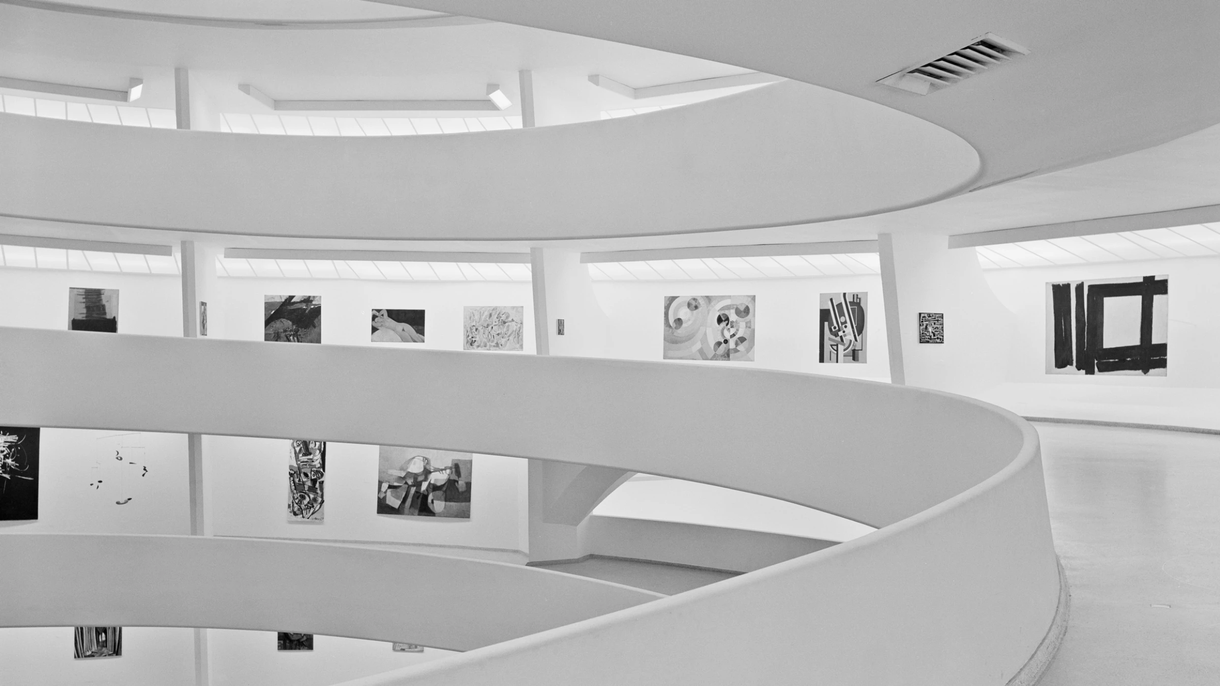 Historic installation view inside the Guggenheim Museum showing art in an architecturally prominent public setting.