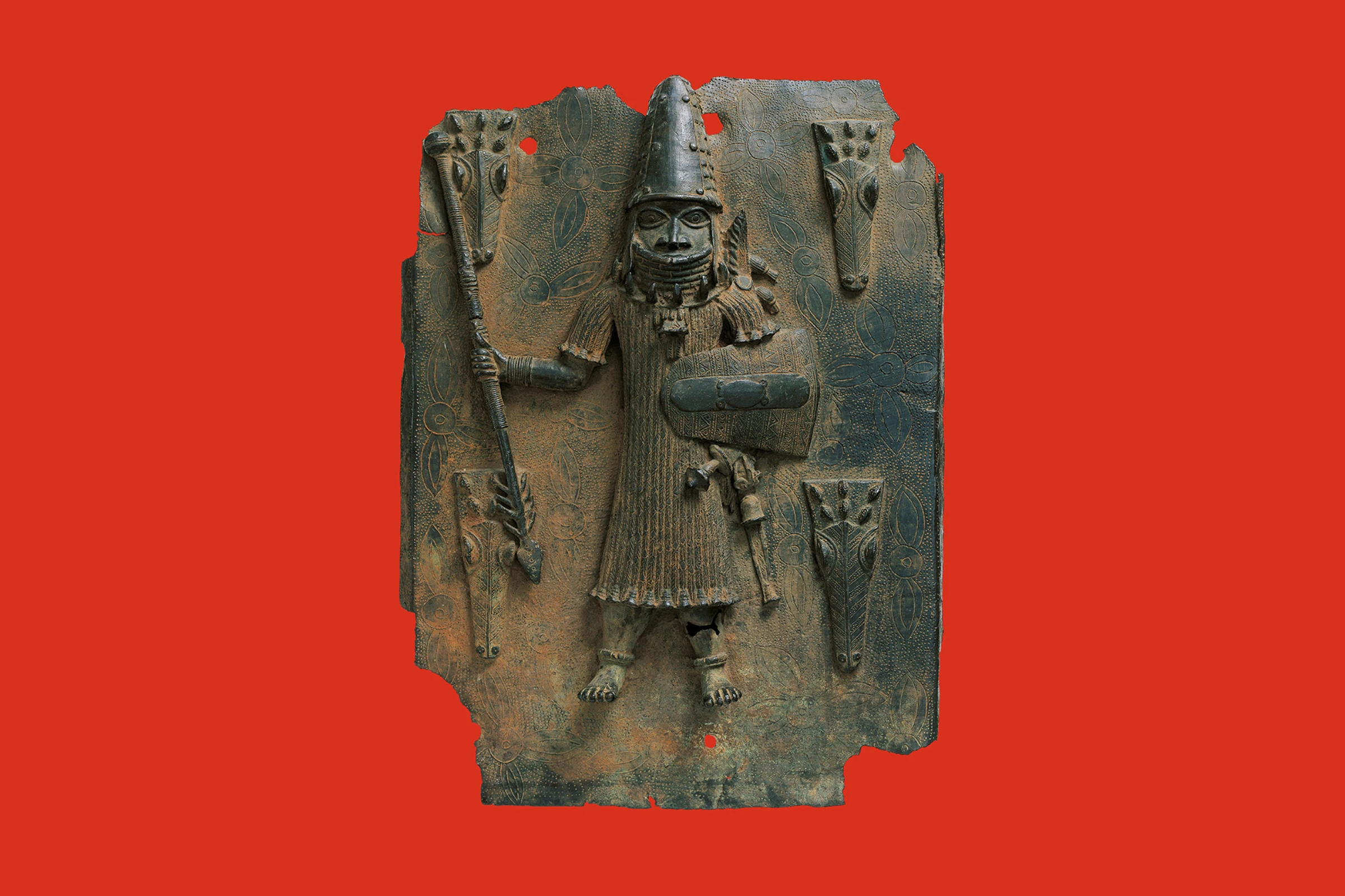 Benin objects displayed in a museum exhibition context, emphasizing provenance and restitution research.