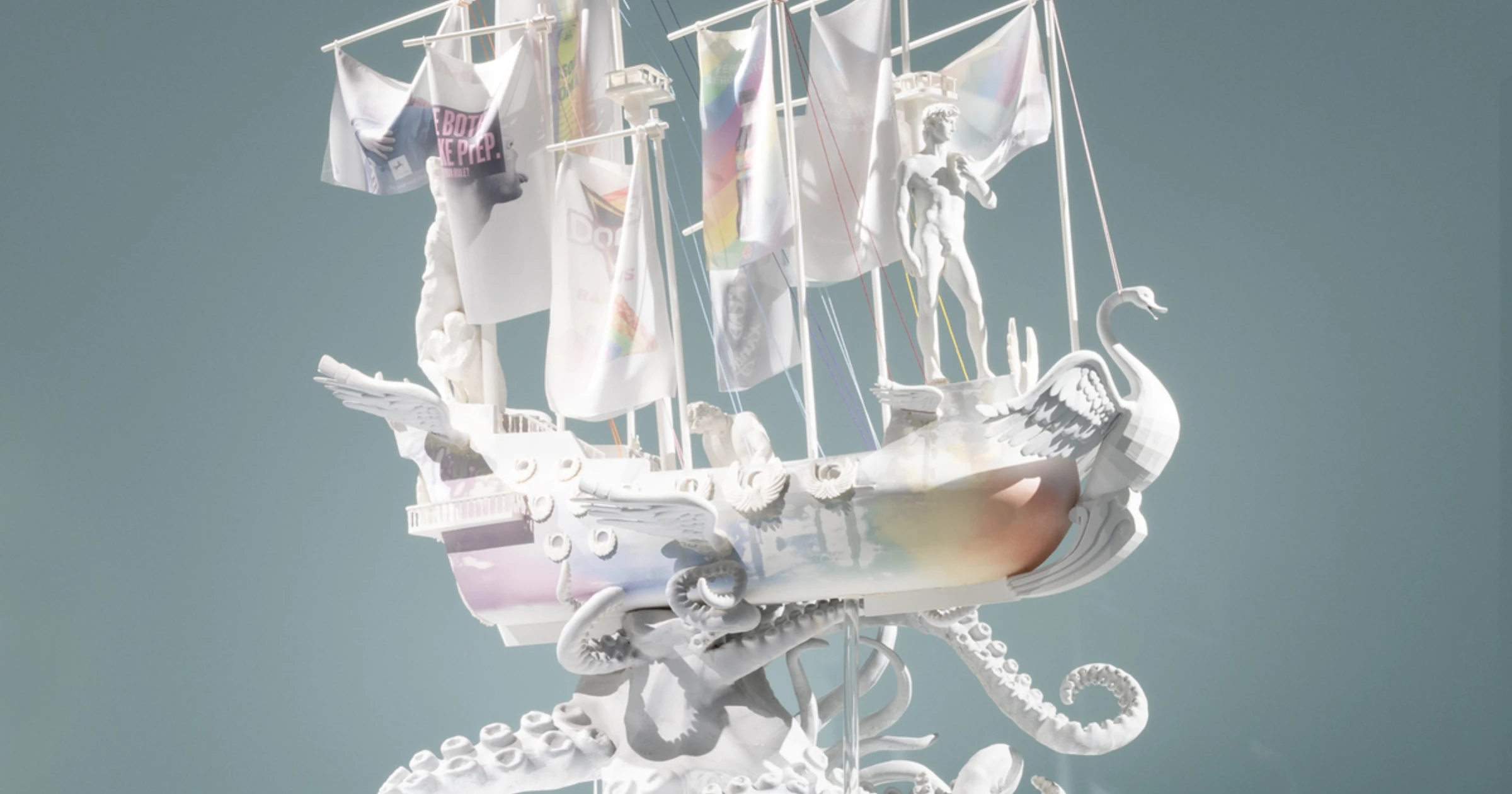 Installation view of Simon Fujiwara work featuring the character Who the Baer in a large painted composition.