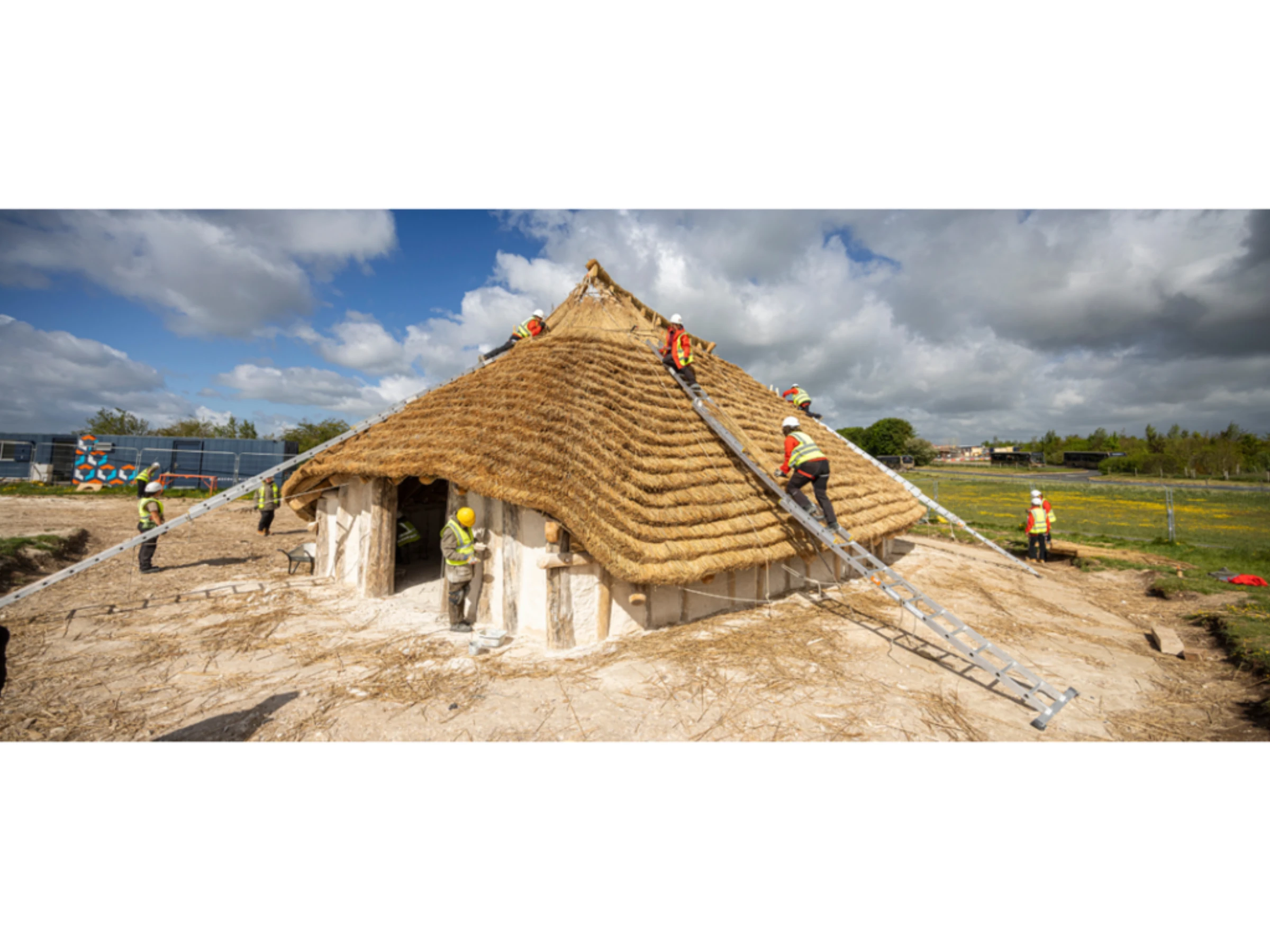 Reconstructed Neolithic community hall near Stonehenge built with timber, thatch and historically accurate techniques