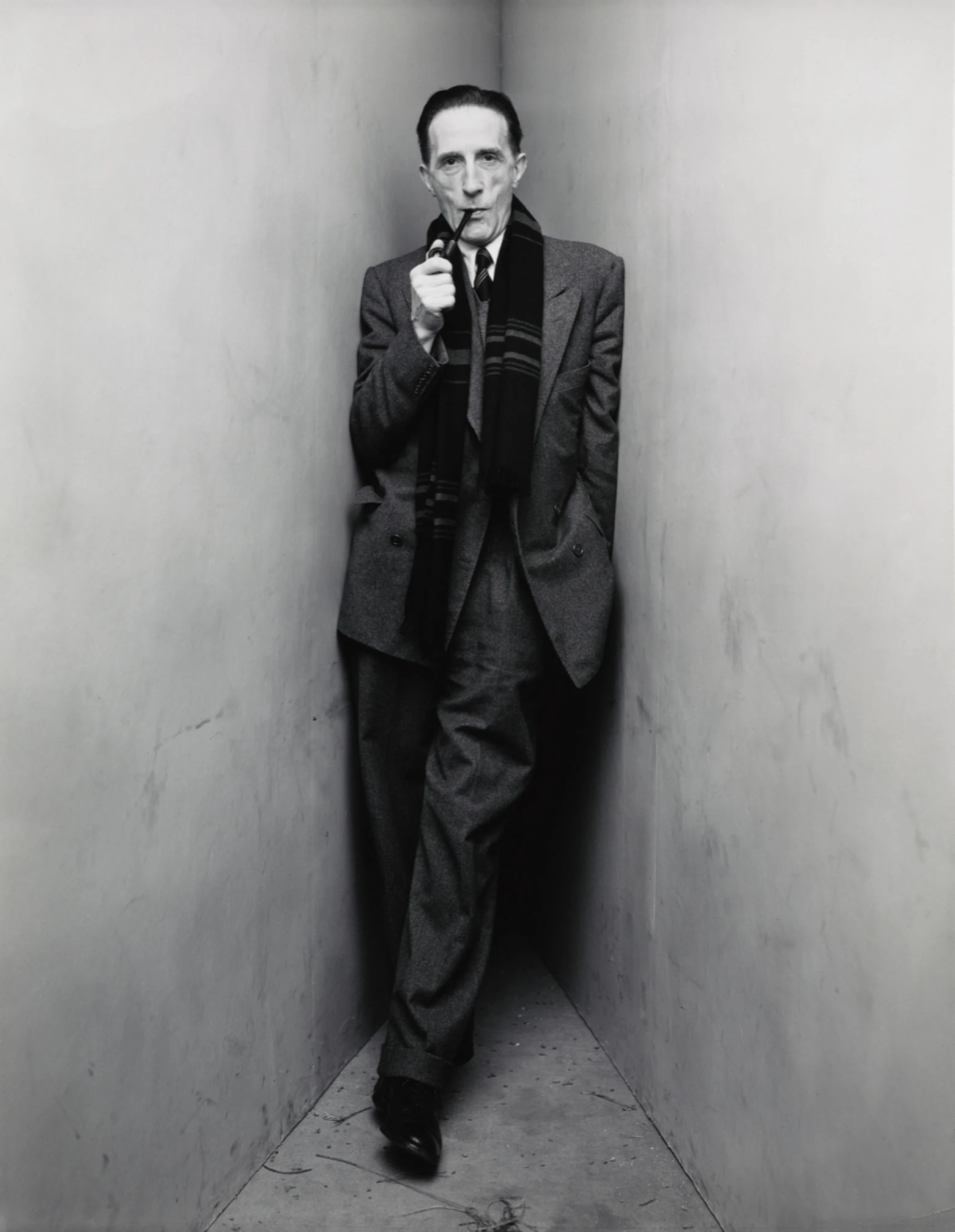 Portrait of Austrian artist Valie Export against a dark background