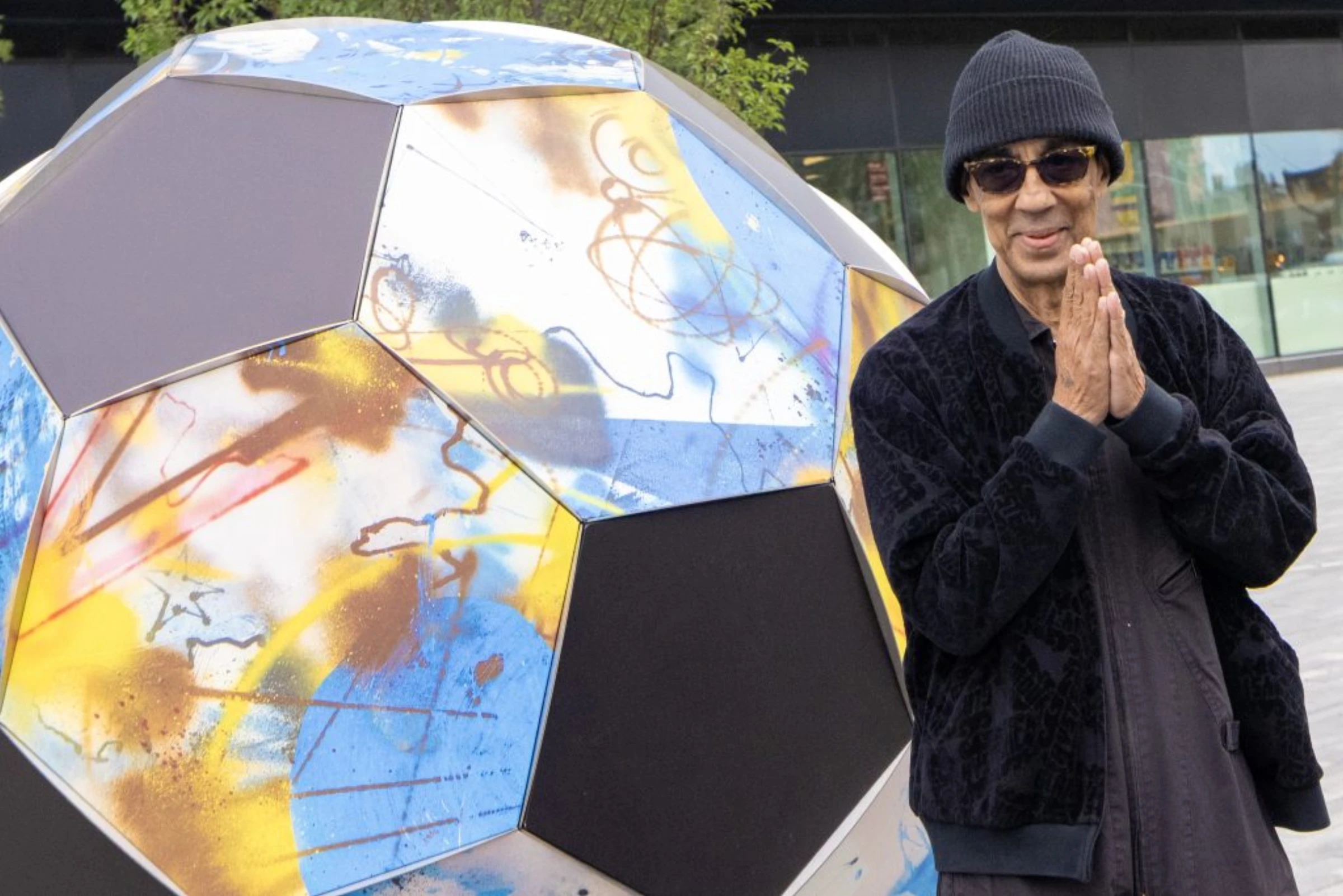 Large artist-designed soccer ball sculpture installed in Journal Square for The Art of the Game project